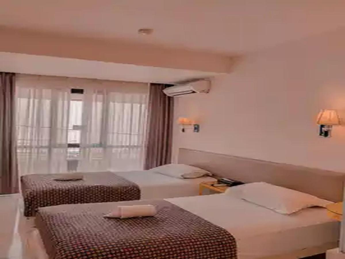 Dewarna Hotel Arifin Bunul Bagian luar foto