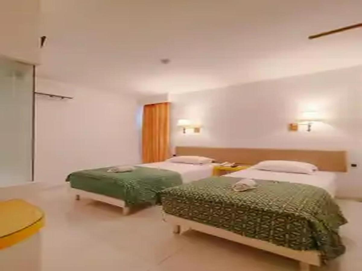 Dewarna Hotel Arifin Bunul Bagian luar foto